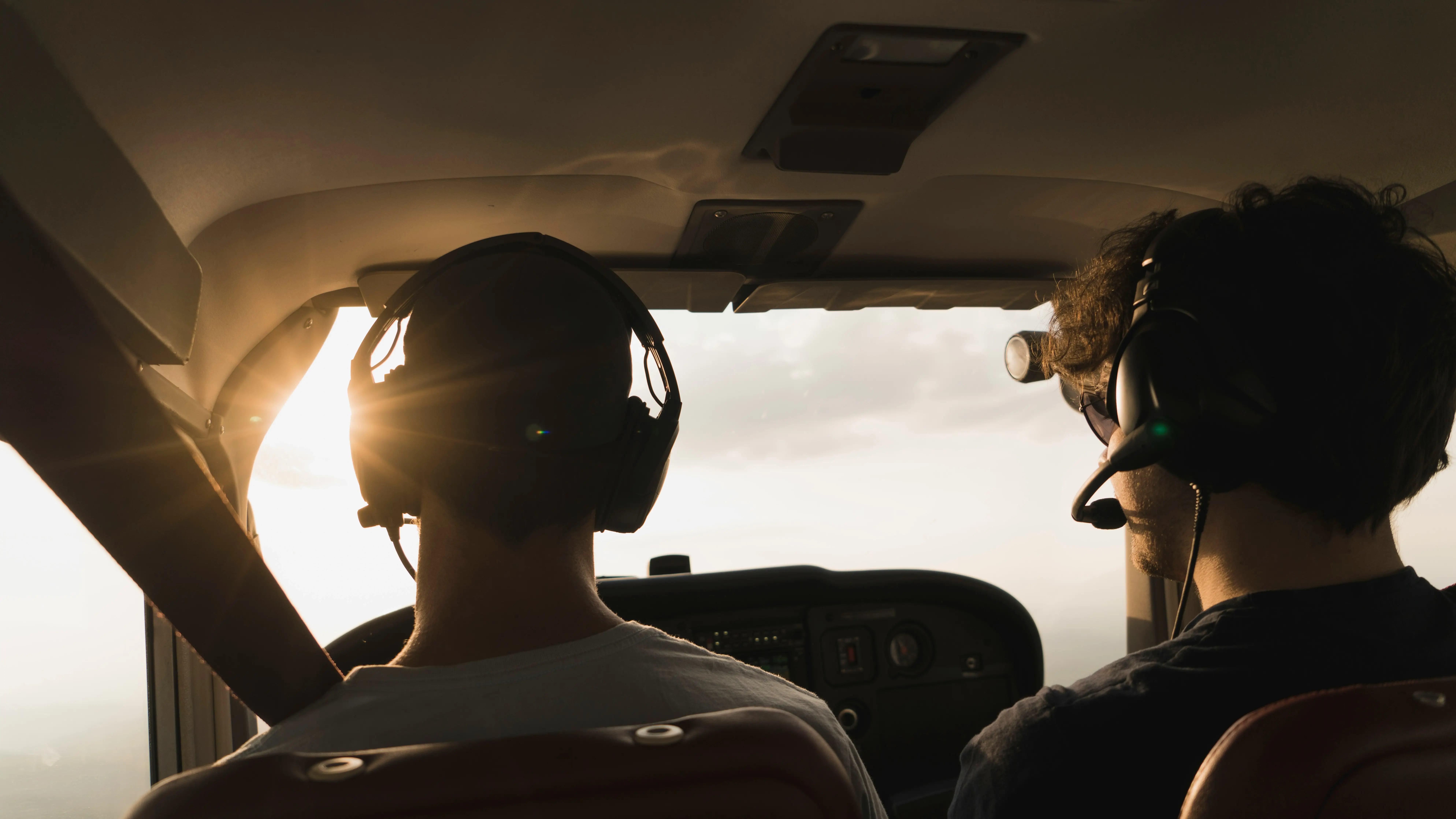 Student pilot practicing on simulator, instrument rating training