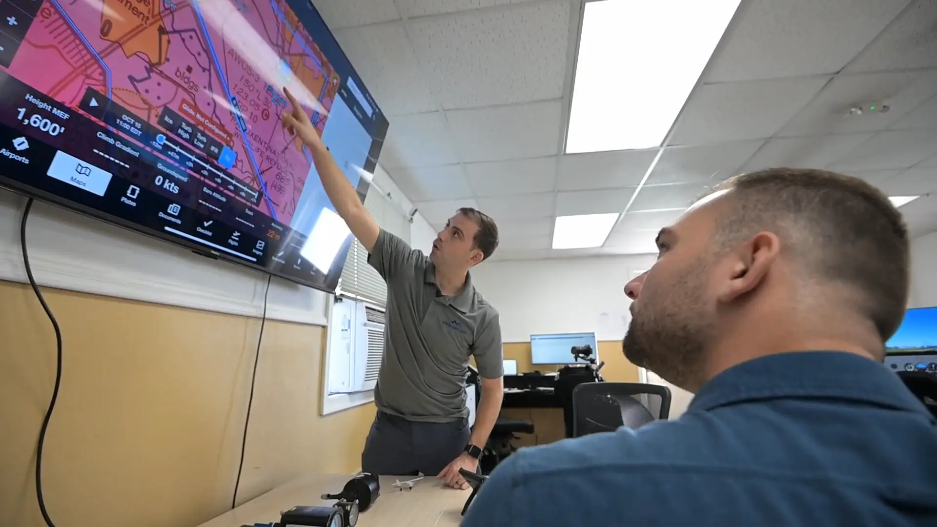 Student using FAA Compliant flight simulator at Solid Ground Aviation