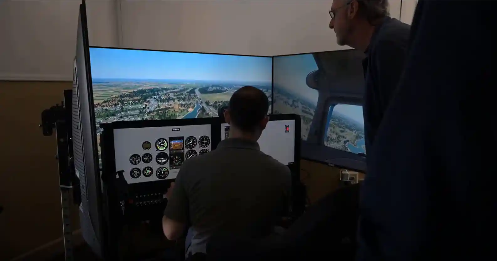 Pilot training intensively in a professional flight simulator
