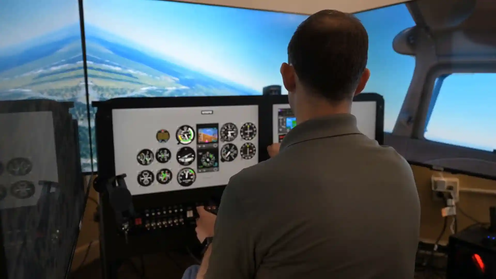 Instructor practicing maneuvers on simulator