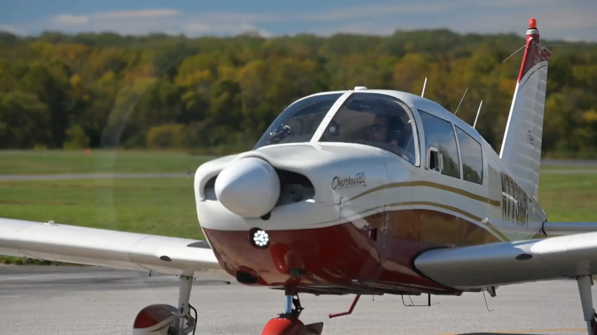 Plane pilot taking off front view