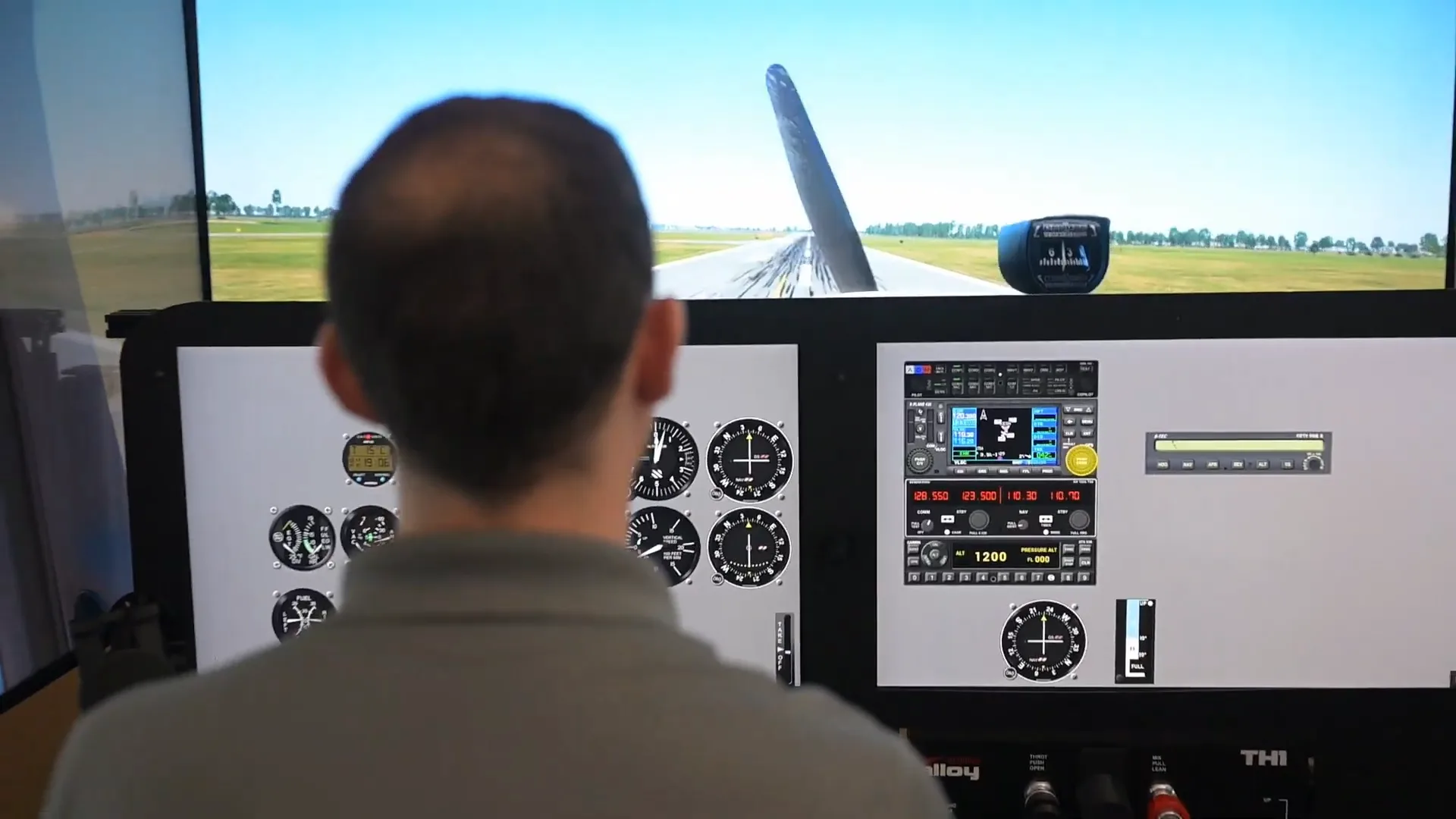 Pilot flying an instrument scenario in the SG-2 simulator