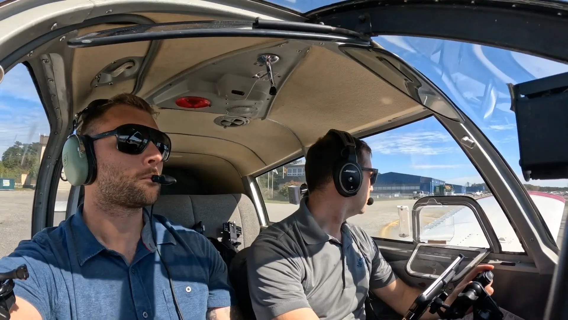 Pilot in the cockpit preparing for takeoff during instrument training